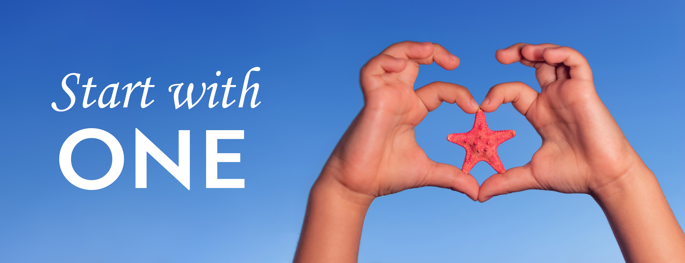 Love shape child hands with starfish. Summer background.